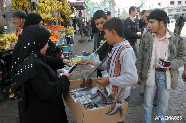 Palestinians shopping at the popular Al-Zawya market in Gaza City on Dec. 18, 2010. Photo by Mohammed Asad