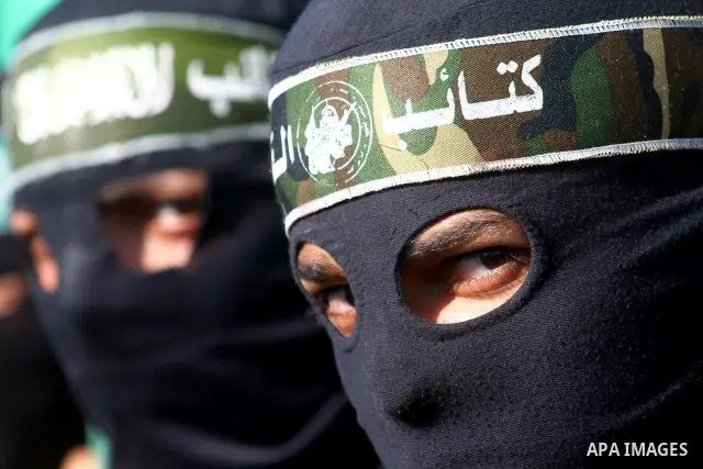 Hamas supporters take part in a protest in Nusseirat refugee camp, central Gaza Strip in the southern Gaza Strip on December 24, 2010, calling for the release of Hamas prisoners from jails in the West Bank controlled by...