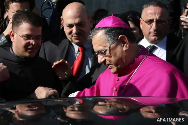 The Latin Patriarch of Jerusalem Fouad Twal arrives to the West Bank city of Bethlehem December 24, 2010. Twal crossed from Jerusalem into Bethlehem through a checkpoint on Thursday to attend an annual Christmas processi...