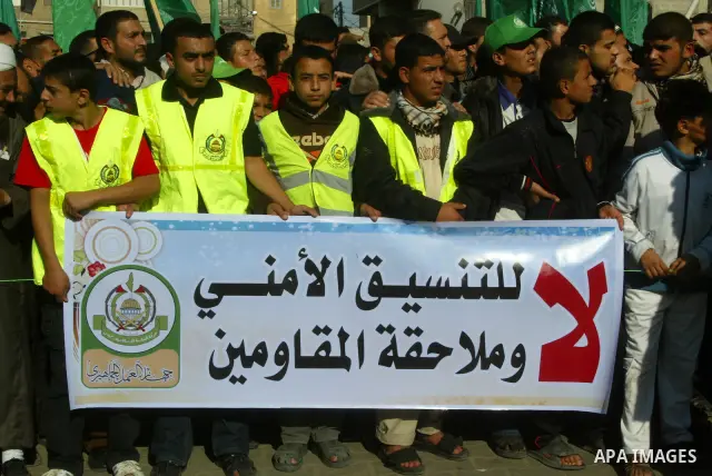 Hamas supporters take part in a protest in Khan Yunis in the southern Gaza Strip December 24, 2010, calling for the release of Hamas prisoners from jails in the West Bank controlled by Palestinian President Mahmoud Abbas...