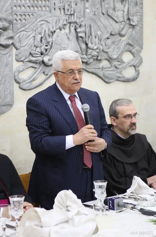 Palestinian President Mahmoud Abbas (Abu Mazen) during dinner Franciscans, in the West Bank city of Bethlehem on Dec. 24,2010. Photo by Thaer Ganaim