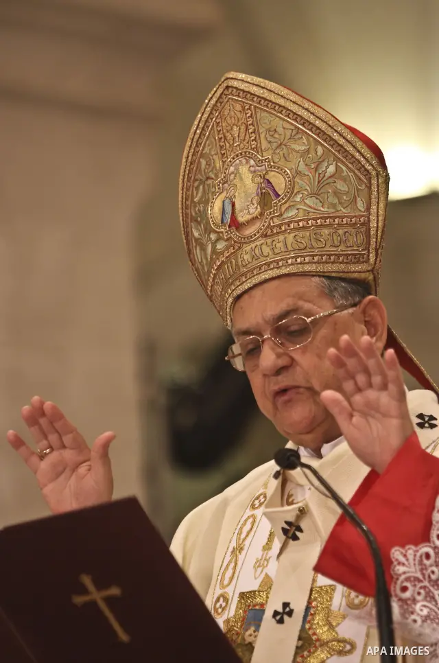 Latin Patriarch of Jerusalem Fouad Twal leads Christmas midnight mass at the Church of the Nativity in the West Bank town of Bethlehem early Dec. 25, 2010. Photo by Fadi Arouri \ POOL