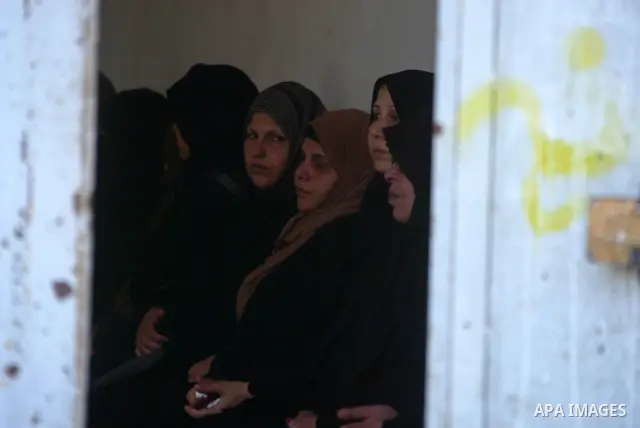 Palestinian relatives mourn over the bode Mahmud Alnajjar fighter of Islamic Jihad during their funeral in Khan Yunis, southern Gaza Strip on December 26, 2010. Israeli forces killed two Palestinian militants Sunday morn...
