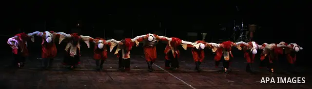 Palestinian folk dancers perform during a cultural event in the West Bank city of Ramallah, Dec. 28, 2010. Photo by Issam Rimawi
