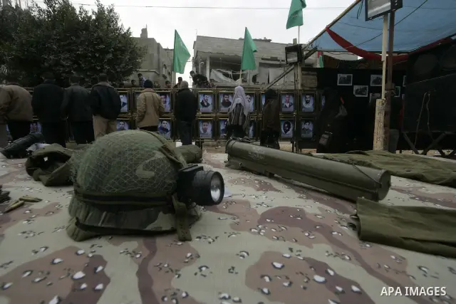 Palestinians attend an exhibition organized by Hamas marks the second anniversary of Israel's three-week offensive on Gaza, in the southern Gaza Strip town of Rafah on December 29, 2010. Which more than a thousand Palest...