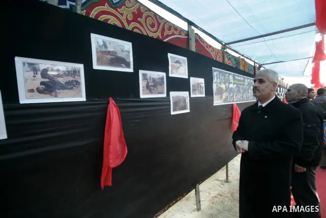 A Hamas Spokesman, Fawzy Barhoum attends an exhibition organized by Hamas marks the second anniversary of Israel's three-week offensive on Gaza, in the southern Gaza Strip town of Rafah on December 29, 2010. Which more t...