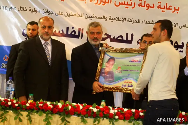 Palestinian Prime Minister in Gaza Strip, Ismail Haniyeh attends a celebration to honor the Palestinian journalists in Gaza City on December 30, 2010. Photo by Ashraf Amra