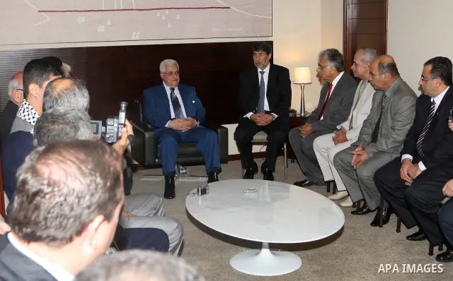 Palestinian President Mahmoud Abbas during a meeting with a delegation from the Palestinian community in Brazil capital of Brasilia on Dec. 30,2010. Photo by Thaer Ganaim