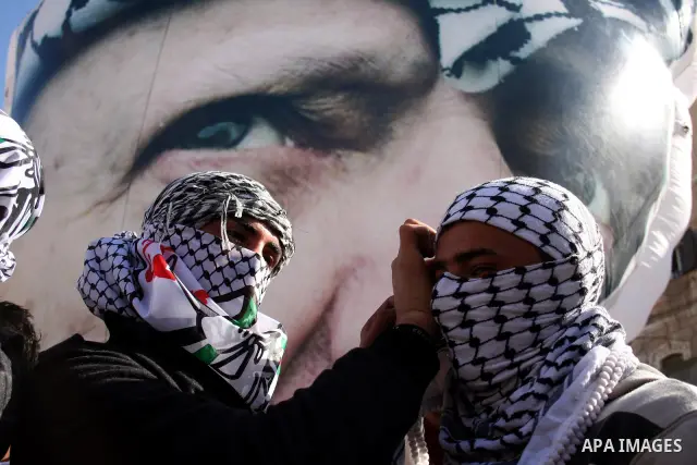 Palestinians take part in the celebrations marking the 46th anniversary of the creation of their Fatah movement in the West Bank city of Ramallah on January 3, 2011. The secular Fatah movement was founded by the iconic l...