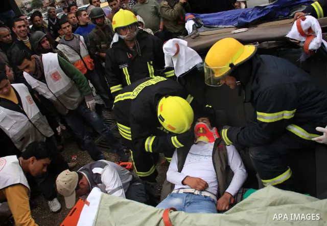 Members of Palestinian National Security Forces, Civil Defense and Red Crescent take part in a training an emergency evacuation , in the West Bank city of Qalqilya, Thursday, Jan. 6, 2011. Photo by Wagdi Eshtayah