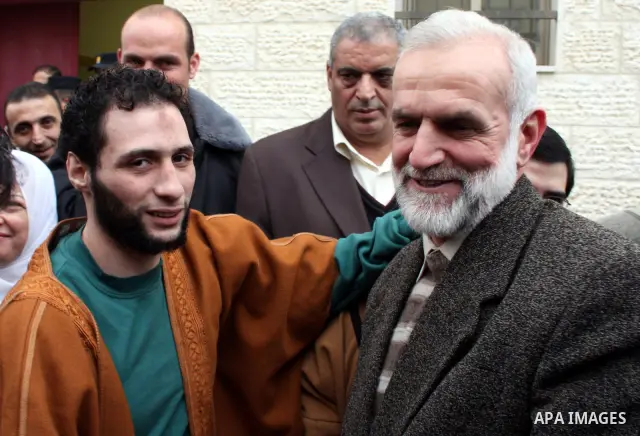 Palestinians greet the six Hamas detainees who refrained from eating for 45 days after they released from a Palestinian Authority prison according to Palestinian President Mahmoud Abbas' order, in the West Bank city of H...