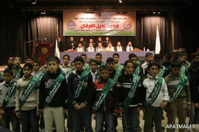 Palestinian Holy Quran memorizers participate in a celebration at al-Shawwa theatre, in Gaza city on Jan 6,2011. Photo by Mohammed Asad