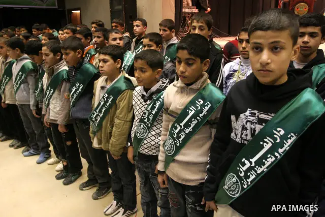 Palestinian Holy Quran memorizers participate in a celebration at al-Shawwa theatre, in Gaza city on Jan 6,2011. Photo by Mohammed Asad