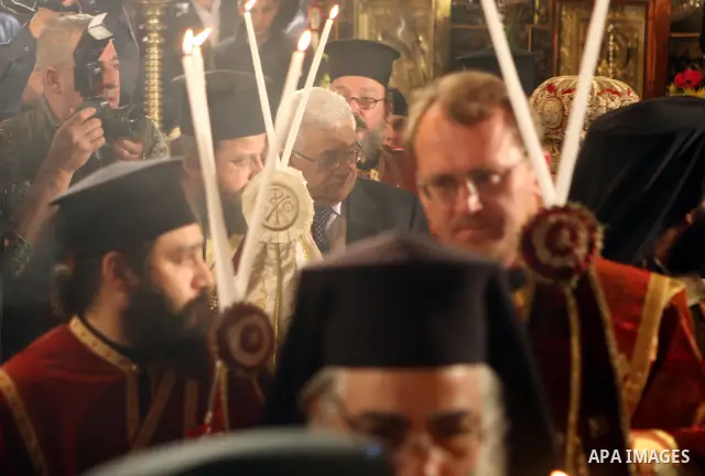 Palestinian President, Mahmoud Abbas (Abu Mazen) participates in the midnight mass for the Feast of Christmas for the Orthodox Christian denominations in the West Bank City of Bethlehem on Jan. 6,2011. photo by Thaer Gan...
