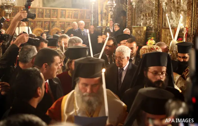 Palestinian President, Mahmoud Abbas (Abu Mazen) participates in the midnight mass for the Feast of Christmas for the Orthodox Christian denominations in the West Bank City of Bethlehem on Jan. 6,2011. photo by Thaer Gan...