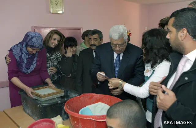 Palestinian President Mahmoud Abbas during a visit to Basma Centre for rehabilitation of disabled persons, in Beit Sahour town east of Bethlehem on Jan. 7, 2011. Photo by Thaer Ganaim