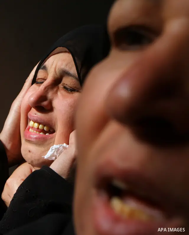 Palestinian relatives of Islamic Jihad militant Mohammed Najjar mourn during his funeral in Khan Younis in the southern Gaza Strip January 12, 2011. A missile fired by an Israeli aircraft killed the Palestinian militant...