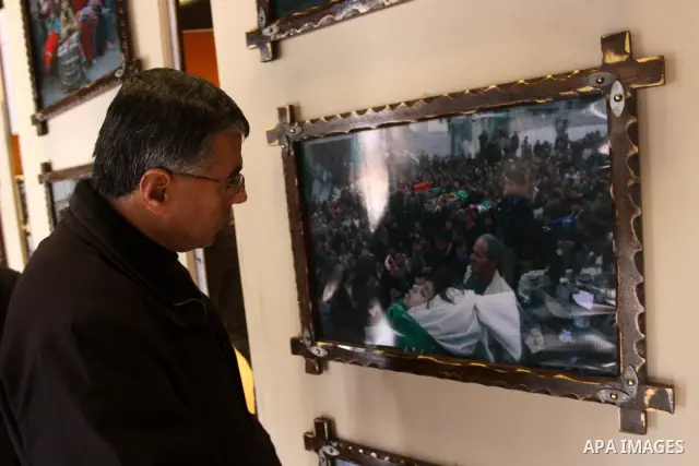 Palestinians attend an exhibition organized by Palestinian High Commission marks the second anniversary of Israel's three-week offensive on Gaza, at al-Shawwa theatre, in Gaza city on Jan 16, 2011. Photo by Mohammed Asad