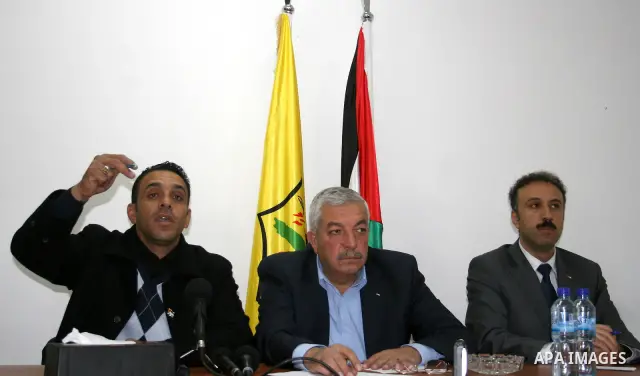 Adnan al-Ghaith, a member of the Committee for the Defense of Silwan (L), Mahmoud Aloul, Central Committee member of the Fatah movement (C), and Ahmed al-Assaf, the spokesman of the Fatah movement (R) attend a press conf...