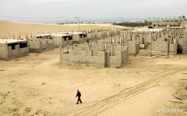 A picture shows unfinished buildings of a UN housing project in Rafah refugee camp in the southern Gaza Strip on January 17, 2011. Said Adnan Abu Hasna, media adviser in the UN Relief and Works Agency for Palestine refug...