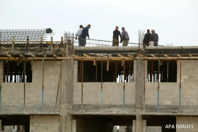 A picture shows unfinished buildings of a UN housing project in Rafah refugee camp in the southern Gaza Strip on January 17, 2011. Said Adnan Abu Hasna, media adviser in the UN Relief and Works Agency for Palestine refug...