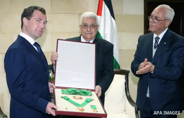 Palestinian President, Mahmoud Abbas (Abu Mazen) grants the Russian President Medvedev the Star of Jerusalem in the West Bank City of Jeicho on Jan. 18,2011. photo by Thaer Ganaim