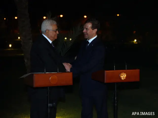 Palestinian Authority President Mahmud Abbas (L) shakes hands with Russian President Dmitry Medvedev (R) during a visit to the Jericho Museum in the West Bank Oasis town of Jericho on 18 January 2011. Photo by Thaer Gana...
