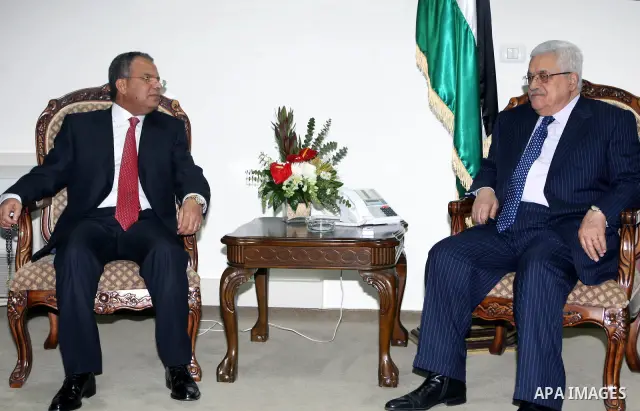 Palestinian President, Mahmoud Abbas (Abu Mazen)during a meeting with Mohammed Hassan Albergti, Libya's Ambassador to Jordan in the West Bank City of Ramallah on Jan. 19,2011. photo by Thaer Ganaim