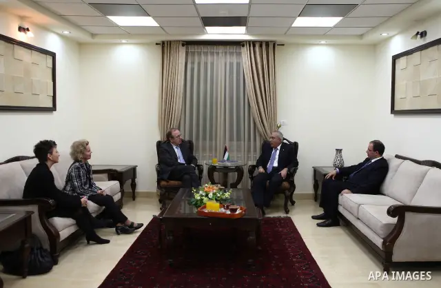 Palestinian Prime Minister, Salam Fayyad during his meeting with the head of the Finland central Bank in the West Bank city of Ramallah on Jan. 20,2011. Photo by Mustafa Abu Dayeh