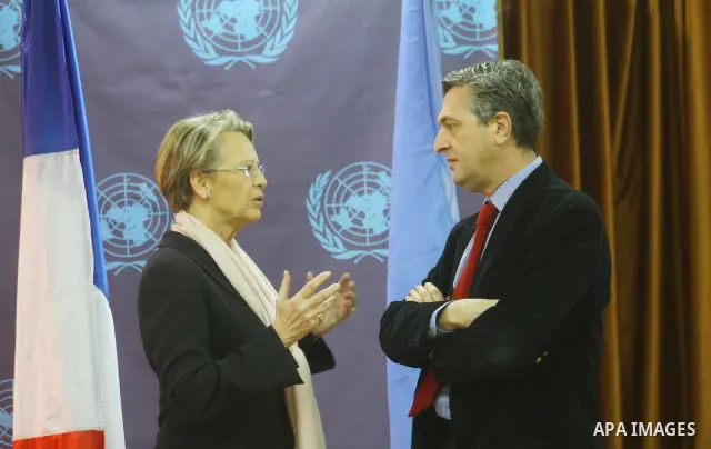 French Foreign Minister Michele Alliot Marie speaks with Filippo Grandi, commissioner-general of the UN Relief and Works Agency, after a press conference at the U.N. office in Gaza City, on Jan. 21, 2011. A crowd of furi...