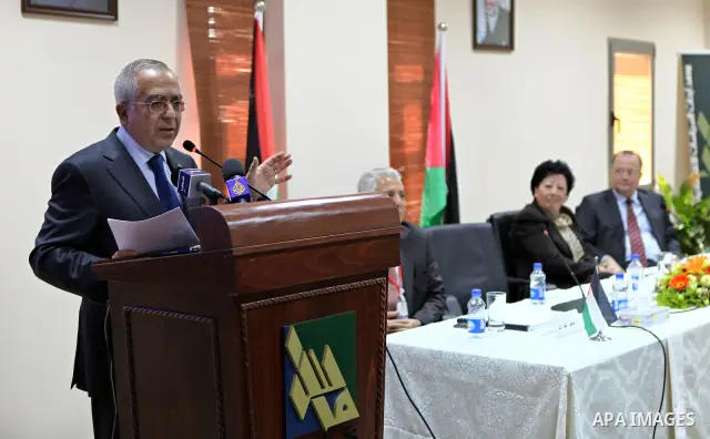 Palestinian Prime Minister, Salam Fayyad attends the opening ceremony of the annual conference held by Mass institution in the West Bank city of Ramallah on Jan. 23,2011. Photo by Mustafa Abu Dayeh