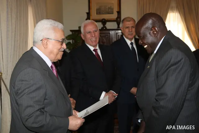 Palestinian President Mahmoud Abbas, accepts the credentials of the Ambassador of the Republic of Zimbabwe, in Cairo on Jan. 24, 2011. Photo by Thaer Ganaim