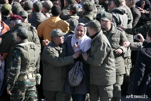 Tunisian protesters gather to demand a new government free of officials of the ousted regime of former president Zine el Abidine Ben Ali, near the Prime Minister's office in Tunis, Tunisia, 24 January 2011. According to...