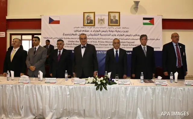 Palestinian Prime Minister, Salam Fayyad Czech's Foreign Minister, Karel Schwarzenberg attend the opening ceremony of the Electrical Transformers maintenance in the West Bank town of Tubas on Jan. 24,2011. Photo by Musta...