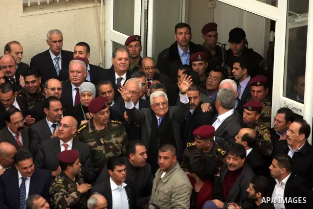 Palestinian President Mahmoud Abbas is welcomed by his supporters upon his arrival from Cairo at the West Bank city of Ramallah January 25, 2011. Abbas got a hero's welcome on Tuesday from thousands of Palestinians who d...