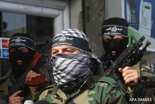 Palestinian militants from the al-Aqsa Martyrs Brigades give a press conference in which they denounced the alleged major concessions made by rival Palestinian leaders during peace talks with Israel, on January 27, 2011...