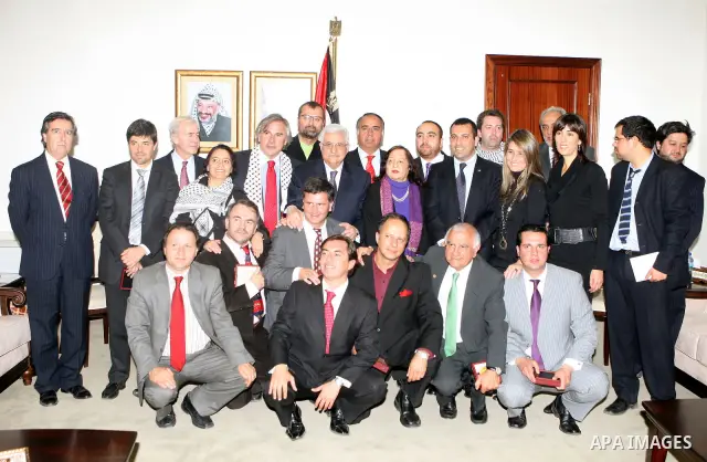 Palestinian President Mahmoud Abbas during a meeting with a parliamentary delegation from Chile headed by Ivan Moreira Barros in the West Bank city of Ramallah, on Jan. 27, 2011. photo by Thaer Ganaim