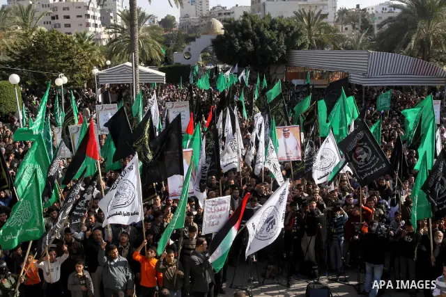Palestinians protest against Palestinian President Mahmoud Abbas and his government following a recent broadcast by Al-Jazeera reportedly linking him to making broad concessions to Israel in peace talks, in Gaza city, Fr...