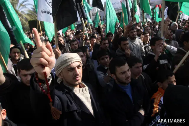 Palestinians protest against Palestinian President Mahmoud Abbas and his government following a recent broadcast by Al-Jazeera reportedly linking him to making broad concessions to Israel in peace talks, in Gaza city, Fr...