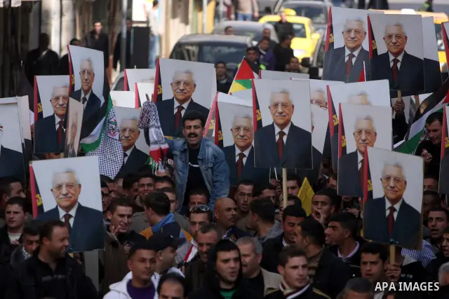 Palestinian Fatah supporters take part in a rally in support of Palestinian President Mahmoud Abbas and against the Al-Jazeera TV station in the West Bank city of Ramallah, Friday, Jan. 28, 2011. The Qatar-based Arab sat...
