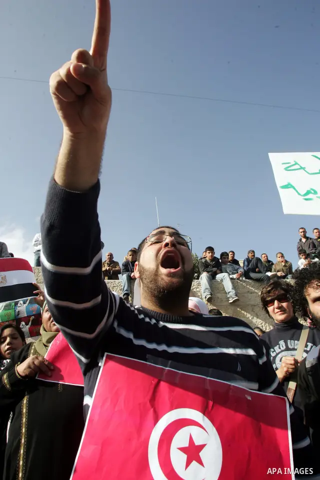 Palestinian demonstrators take part to show the solidarity with protestors in Egypt and Tunisia at Damascus Gate, outside Jerusalems' Old City, Friday, Jan. 28, 2011. Photo by Mahfouz Abu Turk