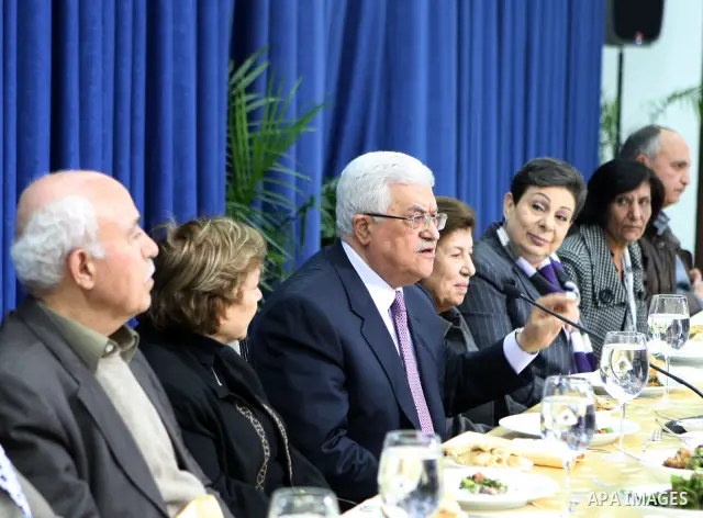 Palestinian President, Mahmoud Abbas (Abu Mazen) meets with a delegation from the General Union of Palestinian women in the West Bank town of Ramallah on Jan. 29,2011. photo by Omar Rashidi