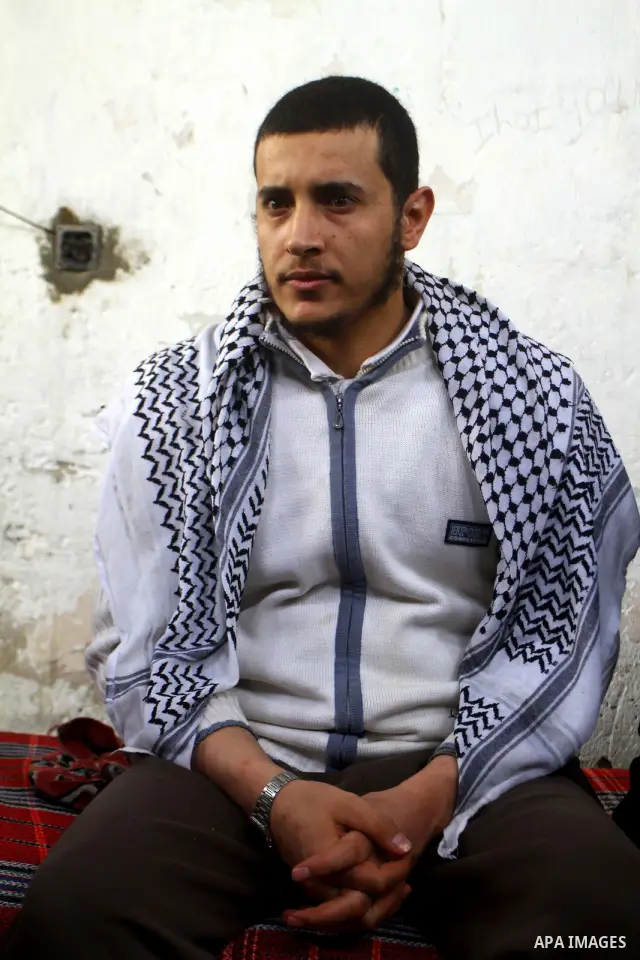 Hassan Weshah a political prisoner arrives to his home after he fled from the prison of Abu Zaabal in Egypt, in the Bureij refugee camp , Sunday, Jan. 30 , 2011. Photo by Ashraf Amra