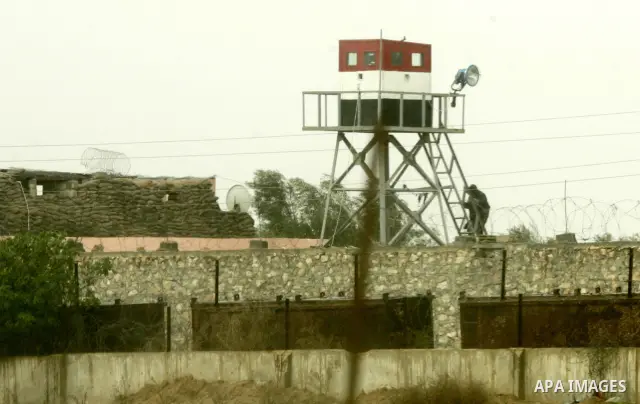 An Egyptian soldier stands guard on a control tower in the border with the Gaza Strip in the city of Rafah, southern Gaza Strip on January, 30, 2011. at least two of the prisoners who had been held in Abu Zaabal prison,...