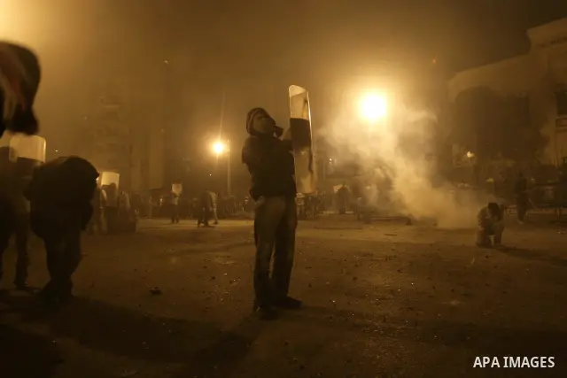 Egyptian policemen fire tear gas canisters towards demonstrators during a protest in Cairo, Egypt, Friday, Jan. 28, 2011. Photo by Karam Nasser
