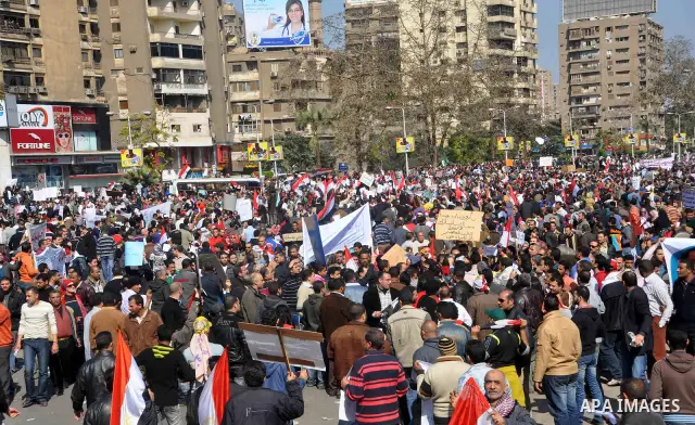 Supporters of President Hosni Mubarak takes part in a protest in Cairo, Egypt, Wednesday, Feb. 2, 2011. Several thousand supporters of President Hosni Mubarak, including some riding horses and camels and wielding whips,...