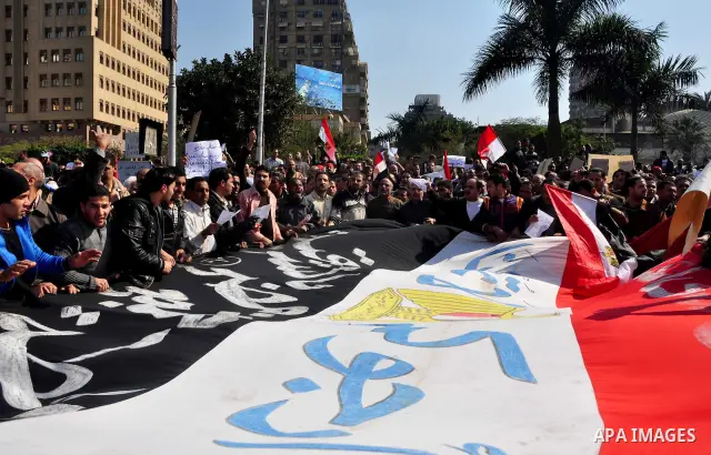 Supporters of President Hosni Mubarak takes part in a protest in Cairo, Egypt, Wednesday, Feb. 2, 2011. Several thousand supporters of President Hosni Mubarak, including some riding horses and camels and wielding whips,...