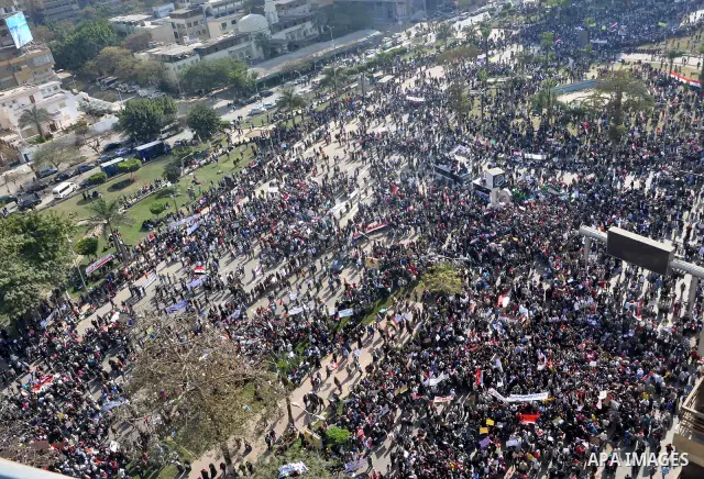 Supporters of President Hosni Mubarak takes part in a protest in Cairo, Egypt, Wednesday, Feb. 2, 2011. Several thousand supporters of President Hosni Mubarak, including some riding horses and camels and wielding whips,...