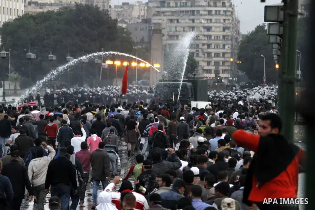 Egyptian policemen fire tear gas canisters towards anti-government protesters during a demonstration against president Hosni Mubarak regime in Tahrir, or Liberation Square in Cairo, Egypt, Jan. 29, 2011. Photo by Karam N...