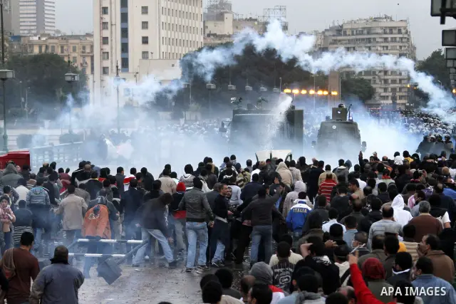 Egyptian policemen fire tear gas canisters towards anti-government protesters during a demonstration against president Hosni Mubarak regime in Tahrir, or Liberation Square in Cairo, Egypt, Jan. 29, 2011. Photo by Karam N...